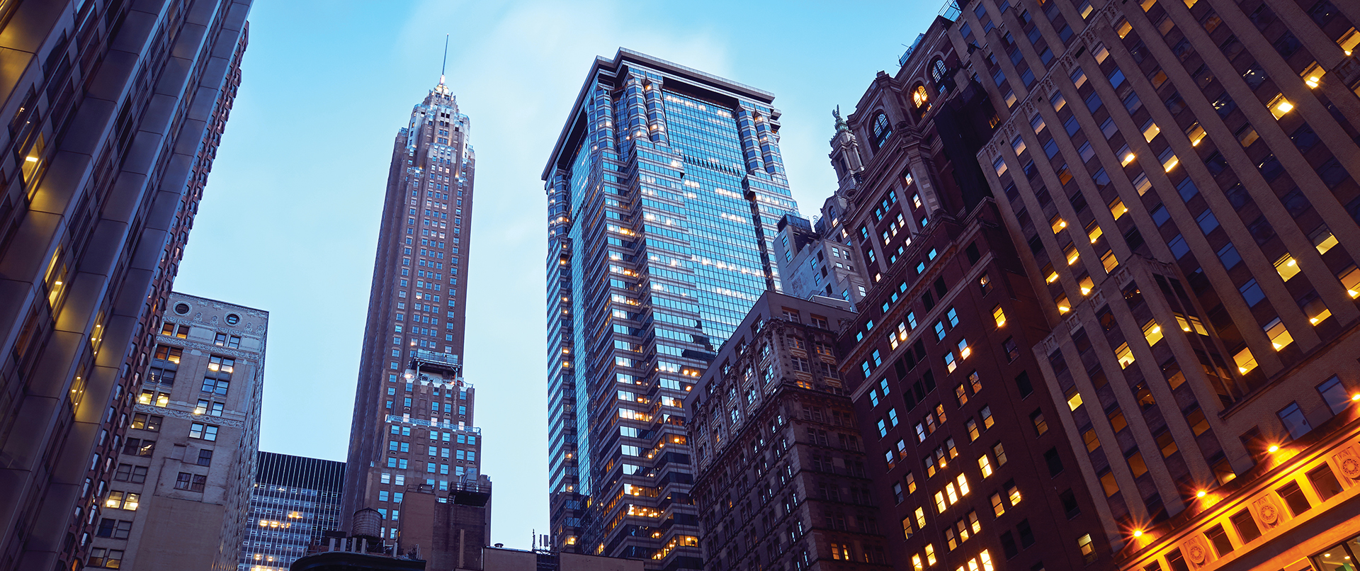 A view of financial district skyscrapers from street level.